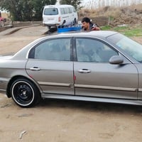 سوناتا وفود  مكينهv 6 موديل2004 رقم بغداد مشروع وطني سياره نضيفه وعليه...