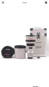 عدسة 300mm ثابت فتحة 2.8 ستبلايزر النظافة 95% الملحقات .. جلدة العدسة ...