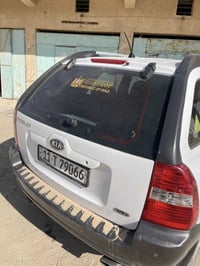 سبورتج موديل 2006فول موصفات شرط كير محرك سياره 6ستندر رقم بغداد اي ستف...