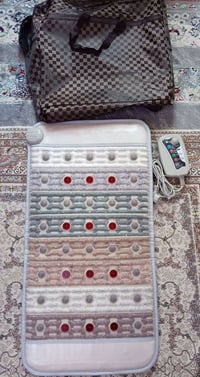 سجادة أشعة تحت الحمراء • أحجار كريمة • مساج ساق وقدم