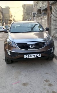 كيا سبورتج لبيع موديل 2012سياره حلوه بسمي محرك 2000مكفوله من صبغ وضربه...