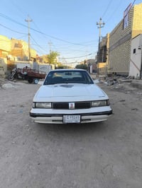 اولدزموبيل • موديل ١٩٩٠ • رقم بغداد