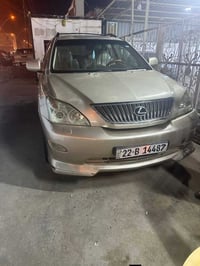 لكزس 2005 RX خليجي بدون حادث بدون صبغ بيها بارد بسيط بالباب عكس السايق...