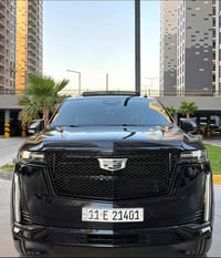 كاديلاك اسكاليد  2021    بلاتينيوم بلاك ادشن وارد امريكي  جاملغ وبنيد ...