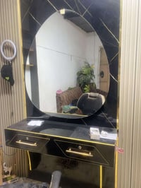مرايا • ميز • بغداد