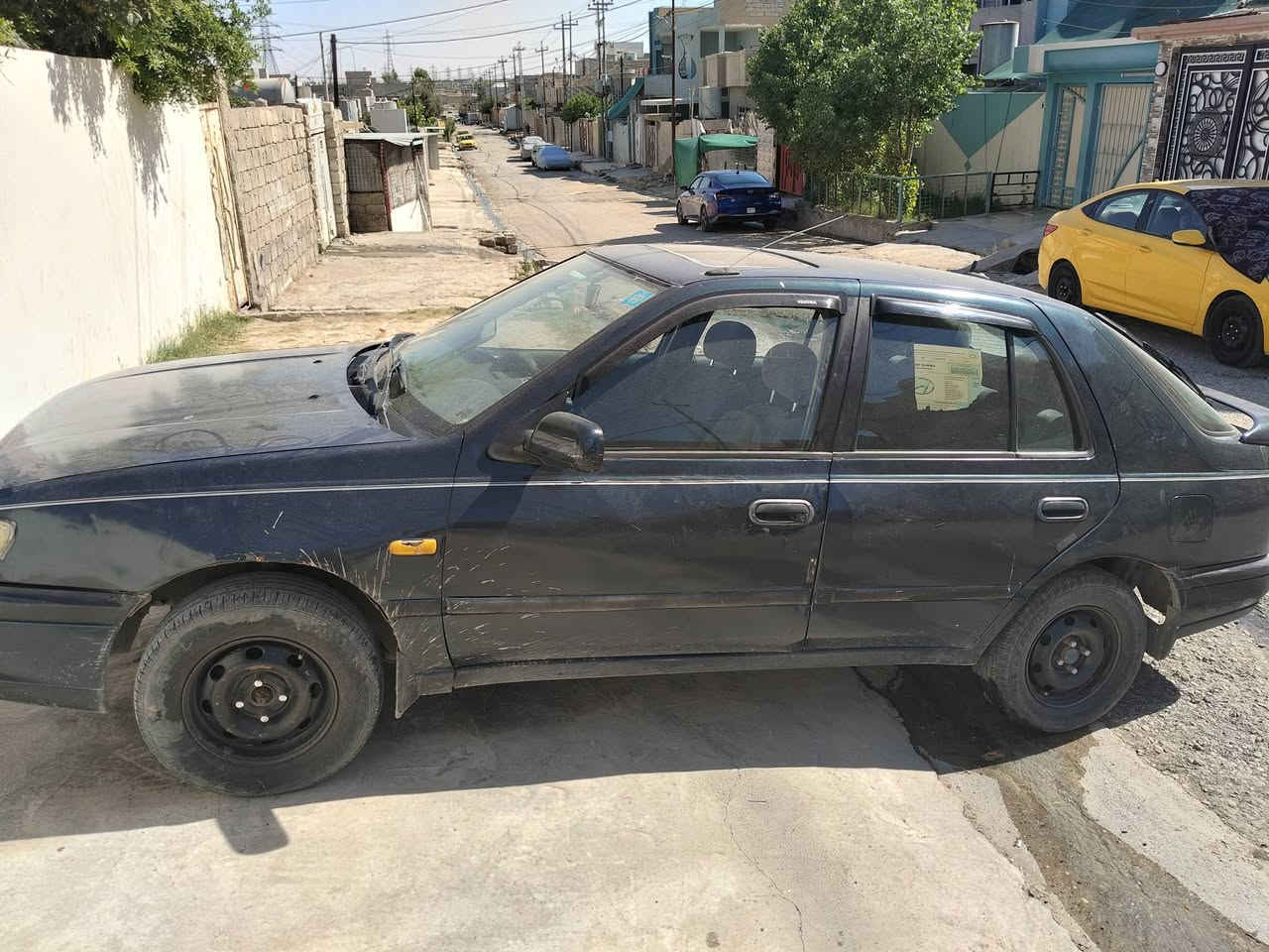 سيارة نيسان صني صبغ حزام الجامات كهرب سيارة حلوة السعر 27 وبيها مجال  ***********
