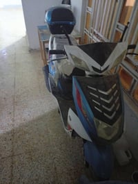 سكوتر بنزين • اوراق بس • دراجة