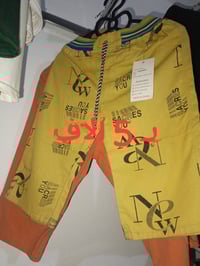 العزيزية الخماس • ملابس رجالية ونسائية • أحذية