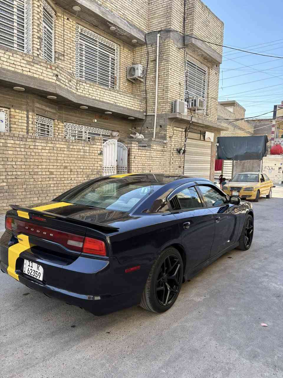 السلام عليكم جارجر موديل 2011السياره بيه جاملغ امامي فقط حادث امريكه السياره جديده و جاهزه من كل النواحي كير مكينه صدر امامي خلفي تخم تاير جديد رقم بغداد بسمي تحويل ثاني يوم وين ميعجبك  رقم الهاتف ***********  مكان السياره بغداد الرصافه بيع فقط بيع فقط بدون مراوس متوازي عل بيع
