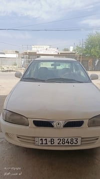 من رخصه الادمن سياره بروتون 2002 بغداد رقم انگليزي بلاديه السياره  تبر...