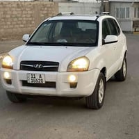 بسم الله الرحمن الرحيم  توسان 2009 خليجي رقم بغداد انكليزي وهزه جديده ...