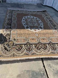 الضلوعيه الامين • معرض معتز العبيدي • سجاد وأثاث