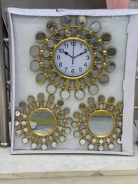 ساعة جداريه • إطار ذهبي • مرايا دائرية