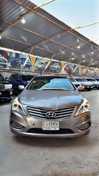 أزيرا 2013  فووول  بانوراما   بصمه وتشغيل عن بعد   شاشه وكامره خلفيه  ...