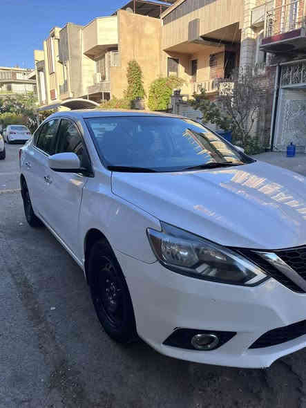 السلام عليكم اخوان 
للبيع نيسان سينترا وارد امريكي ٢٠١٩ لون ابيض 
مواصفات السيارة s.v. عاديه
شاشه و تحكم ستيرن ويل اسود كشنات مخمل لون اسود تبريد شغال مكينه و الكير سي في تي شغال وحالتهم جيده ماكو لاتاخير ولاتبخير..الحداديه و الاطارات جيده 
حادث السياره من امريكا جاملغ الامامي جهه اليسار تبديل و ربع طرف البنيد ايرباك طاك للدشبول و تكم ..ماشيه السياره١٨٠الف كيلو وقابل للزياده
دعاميه بيها شخوط و اكوو ضربه بالدوسه جهه السايق 
السيارة رقم بغداد الالماني حرف ن باسمي وشرط التحويل 
مكانها بغداد الرصافه
سعرها ١٠٤ورقه و بيها مجال ان شاء الله
للاتصال او واتس اب ***********
