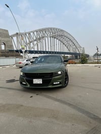 ///. المميزة  لون.   زيتوني.   💚.       2022 دوج جارجر         ماشية. ...