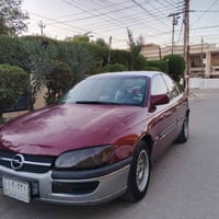 سياره حلوه اوبل بزون سعر 27 وبيها مجال بسيط 07832581190