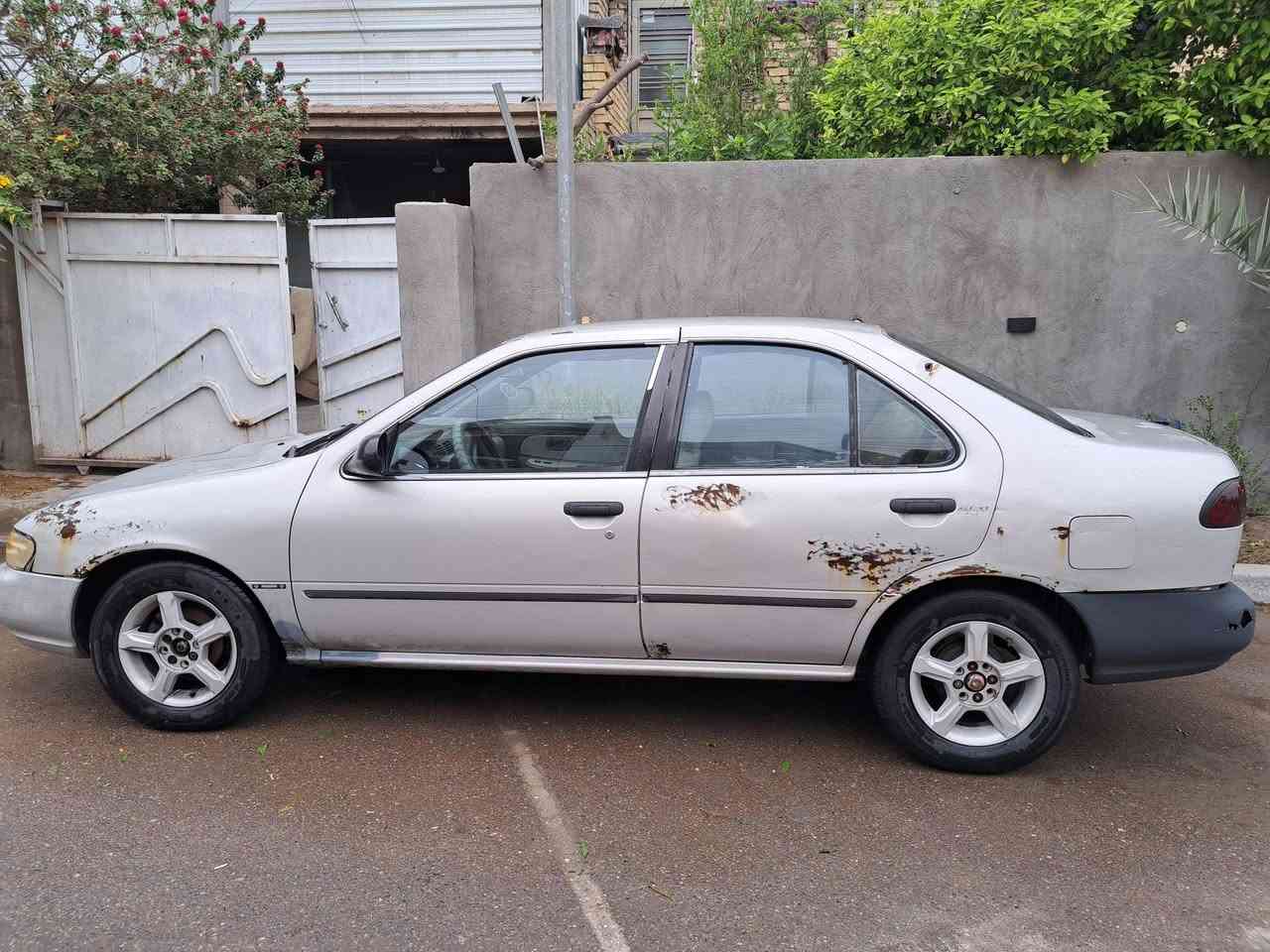 السلام عليكم 
نيسان موديل ٩٧ أيسر بلاد كير اوتوماتيك 
السيارة مسمكرة مابيهه خياسات 
التبريد لطش الكمبريسر 
الدبل الأمامي الأيمن تعبان هو والخلفي الأيمن
المحرك بي صوت ضاغطه وزنجيل 
ومشط الستيرن بي نضوح
كشن السايق والتنته تعبانه
السنوية سقطت صارلها شهرين
السيارة بأسمي ومكانها بغداد حي التراث
السعر ٣٦ وبيهه مجال بسيط
***********
