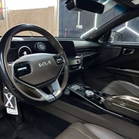 لبيع K8  موديل ٢٠٢٣ بيها جامرلغ نفس لون و بنيد صبغ هايبرد و بانزين سيا...