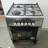 طباخ غاز • ٤ عيون • فرن