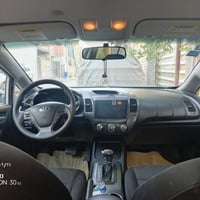 كيا فورتي ابيض وارد كندي 2014 باسمي رقم انكليزي  بدون صبغ كير محرك تبر...