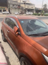 سبورتج مديل 2012. خليجي مكينه 2000 دوش  رقم بغداد   السياره جاهزه من ك...