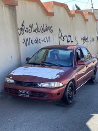 پڕۆتۆن • ٢٠٠٤ • اوتوماتيك