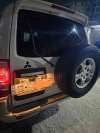 باجيرو 2002 بغداد انكليزي بأسمي السيارة بدون حادث وبدون صبغ بجعه مواصف...