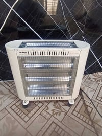 صوبة كهربائية • ٤ شمعات • كربلاء