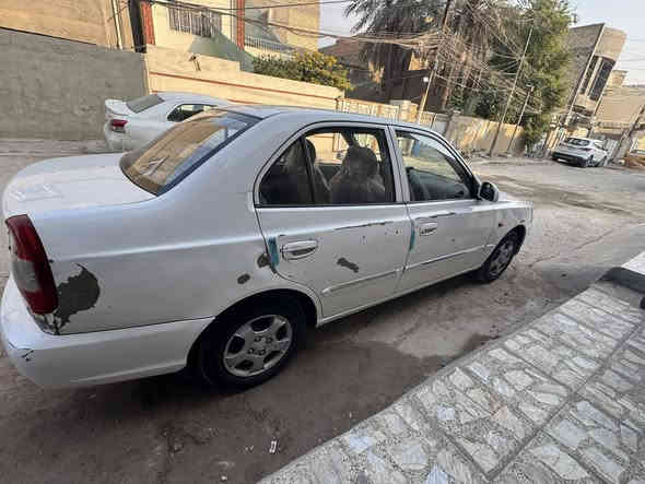 فيرنا ٢٠١٢ للبيع سيارة بيها باب مبدل بشركة عامة الي خلف السايق وجاملغ جهة سايق صبغ وبيها بارد موضح بالفديو كير  اوتماتيك ومحرك خير من الله تبريد منضومة جديدة سيارة كلشي مناقصها متصرف علها كلشي السعر 69 وبيها مجال قليل للشراي تواصل خاص او هذا الرقم فقط واتساب *********** مكان بغداد الامين الثانية
