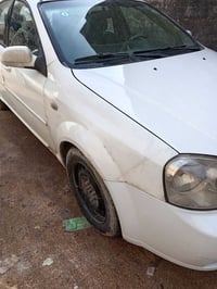 فورنزا موديل 7 سياره كامله مكمله محرك وكير شاده كصه قبل شهر  من نوزلات...