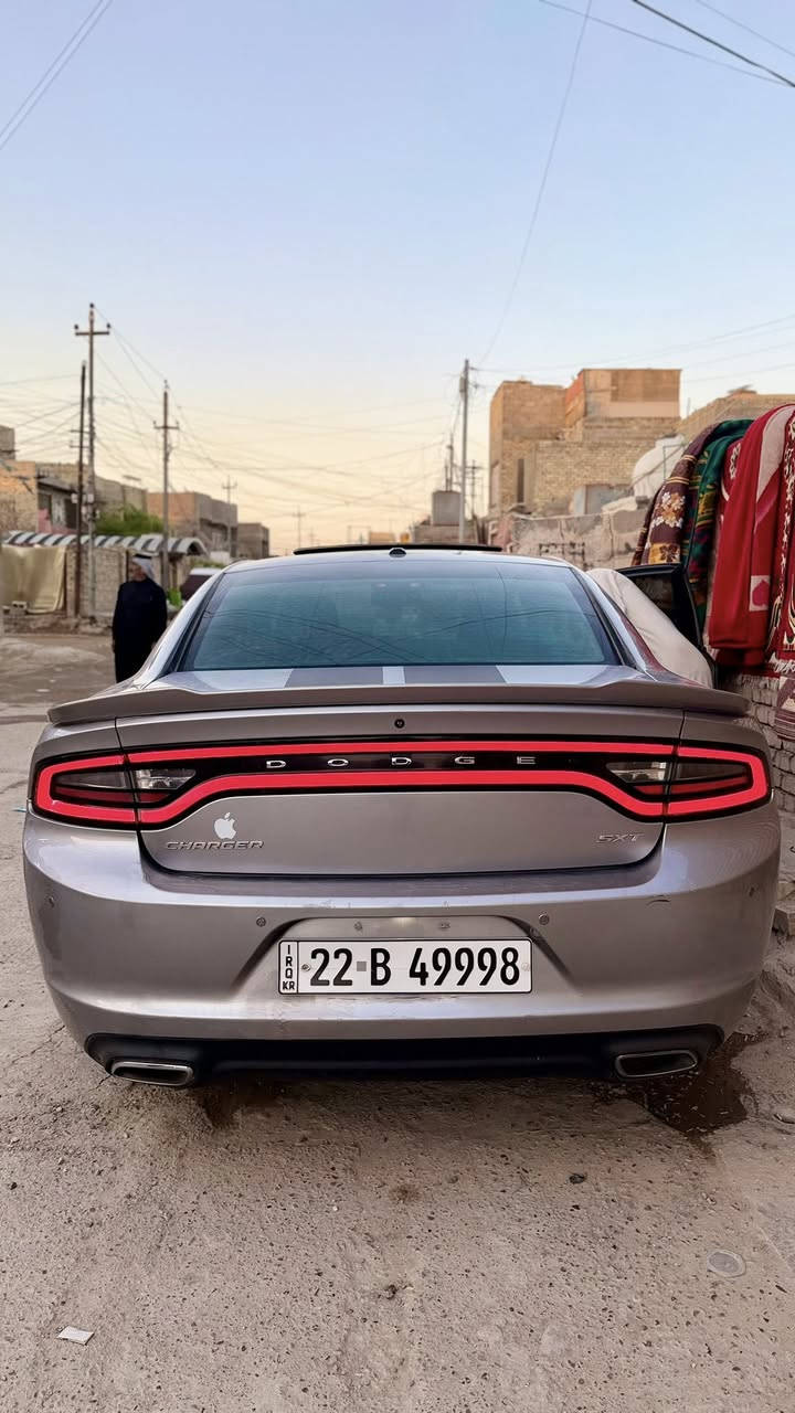 السلام عليكم جارجر للبيع او مراوس بجارجر حمرة او بيضة 
(جارجر موديل 2015 SXT أمريكي)
‏‎( المحرك : 3600 6V) 
‏‎(سيارة كفالة عامة فقط البنيد مصبوغ ) 
(‏‎سيارة شرط الفحص  ( سياره جديدة ) 
‏‎( رقم اربيل  بسمي الجديد تحويل ثاني يوم هزة 2027 )
(دوشمة جديدة تخم تاير جديد)
‏‎المواصفات :
* السيارة فول للأخير .
* فتحة .
‏‎* حساسات خلفية . 
‏‎* شاشه مع نظام كار بلاي . 
‏‎* مصابيح امامية زنون . 
‏‎* لد نهاري  . 
‏‎* مانع انزلاق.
‏‎* تشغيل عن بعد . 
‏‎* محدد سرعة . 
‏‎* بلوتوث . 
‏‎* كاميرا خلفية .
‏‎* دخول ذكي (بصمة) .  
‏‎رقمي *********** 
العنوان : بغداد مدينة الصدر
