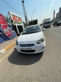 اكسنت خليجي موديل ٢٠١٣ رقم بغداد بسمي تحويل مباشر السيارة مكفولة من ال...