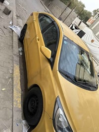 للبيع اكسنت 2012 خليجي  محرك 1600 رقم دولي جديد   السياره بيها ضربه با...