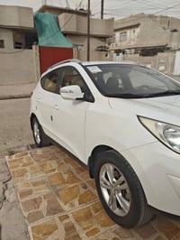 توسان • ٢٠١٣ • تقليم باب الصندوق