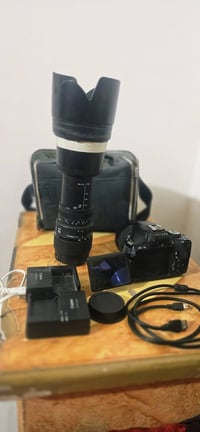 كانون 600D • زوم رياضي • رام ٦٤