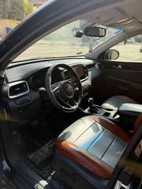 سورنتو وارد امريكي  2016  السيارة ماشية ( 92 الف Mi )  رقم بغداد ( شبه...