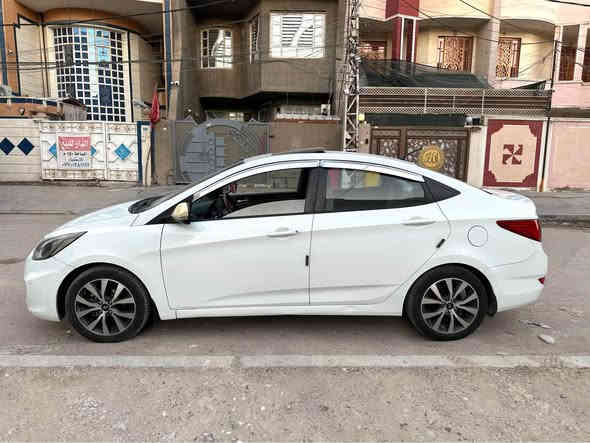 للاتصال *********** متوفر واتس اب سيارة بدون صبغ 
اكسنت موديل 2016 خليجي رقم بغداد انكليزي الجديد  باسمي سنوية وهزة جديدة   محرك ١٦٠٠ دوش دبل قطرة ممتاز كير اوتو ممتاز فتحة سقف فول مواصفات  ارضية مغلفة جلد عده الشركه وكتلوكاتها تبريد تدفئة ممتاز  بدون صبغ بدون حادث  بدون تبديل مكاني بغداد الكرخ سنويه بأسمي لغاية ٢٠٢٩ للبيع السعر 118 $ بغداد
