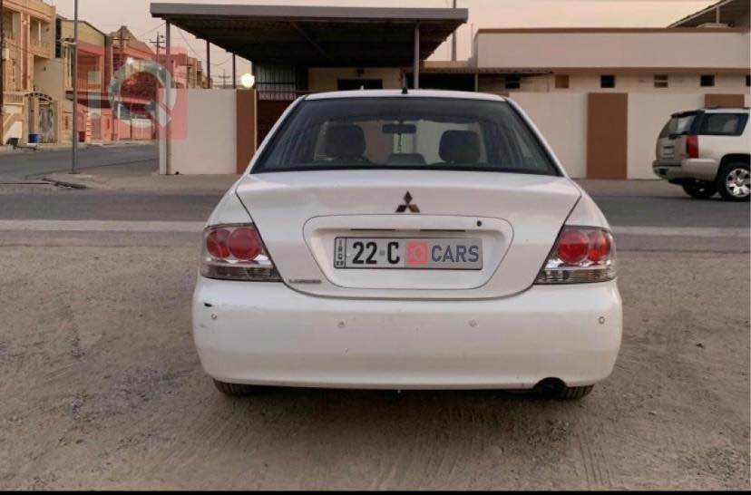 لانسەر ٢٠٠٩ بێ بۆیاغ
مەکینە گچکە 
جام کارەبا 
رەقەم سەنەوی نوێ
بێ بۆیاغ تەنها کەمێک کاڵ بوونەوە و قەپ و قۆپی هەیە لە قەلبی 
سعری ٨٠ وەڕەقە و کەمەک مەجالی برایانە
*********** أربيل, العراق
