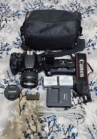 كانون 700D • عدسة 18-55 • ملحقات كاملة