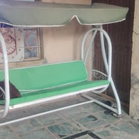 مرجوحة • بغداد • مثل الصور