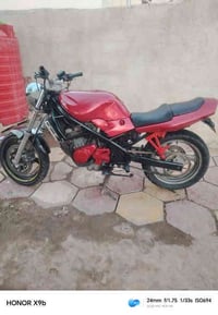 دراجه هوندا ربع محرك مكفول سعر 700 بدون وراق 07887353971