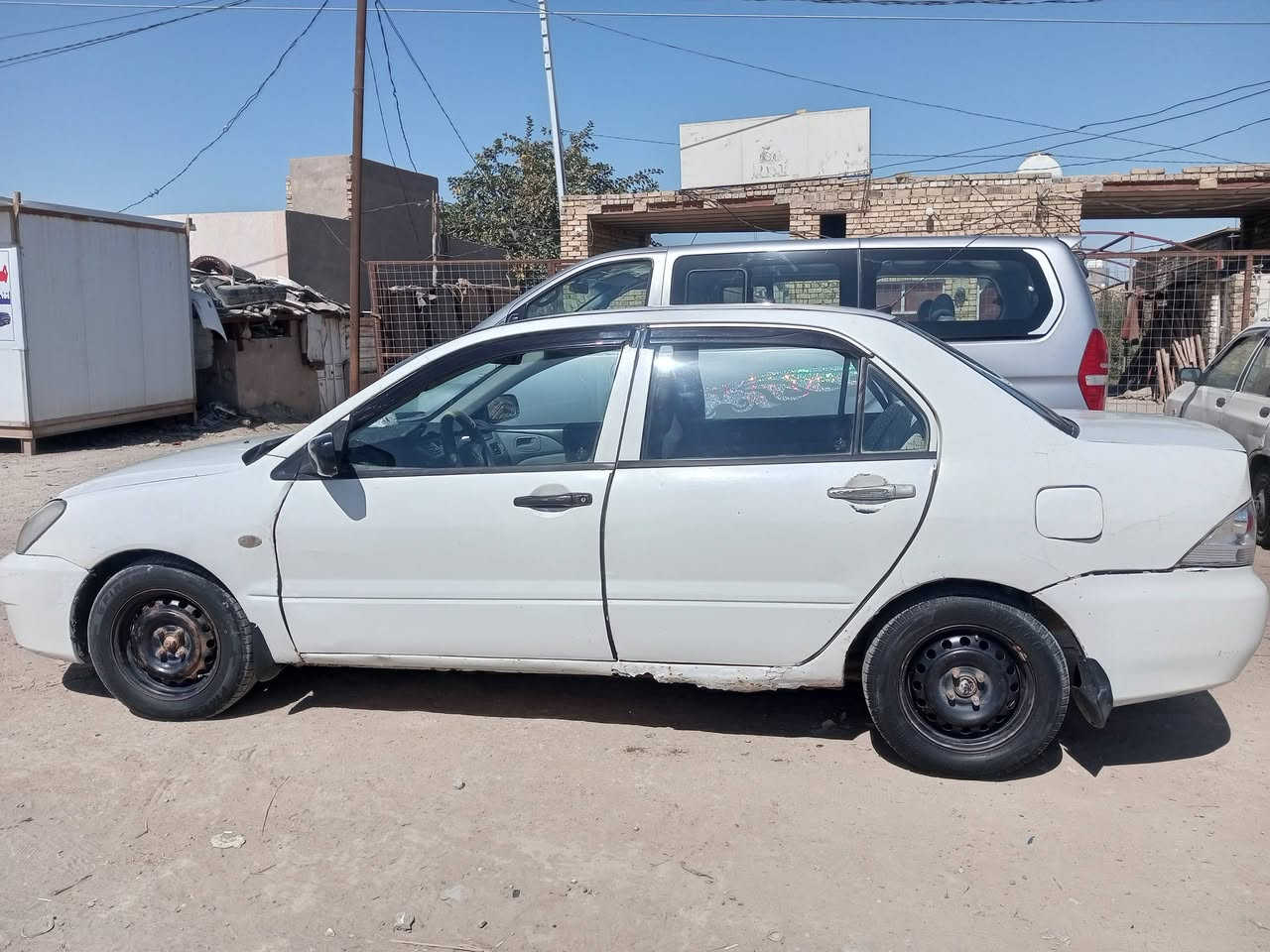 مسبوشي لانسر جاهزة من كلشي مكانه ديوانيه شاميه سعره 48 محرك كير تبريد ثلج حداديه غرف  كهربائية بيه ضربه جنطة صبغ عام 2013 موديل ***********
