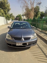 لانسر 2011 • غاز ايطالية • كفاله موتور وكير