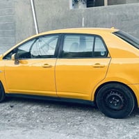 نيسان تيدا موديل 2007 رقم ذي قار احمر تحويل كير محرك صدر كله جاهز تخم ...