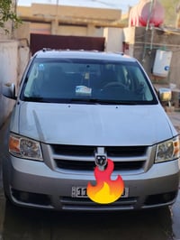 دوج كرفان 2008  مكينه 6    3800 حداديه وصدرها كله جديد  رقم بغداد انكل...