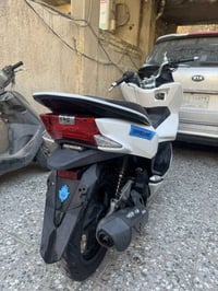 دراجه PCX • أبيض • كاملة كهربا ومكينة