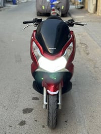 للبيع دراجه pcx ياباني الاصلي  مكينه 150نوزل خطين ستان كهربائي حساس از...
