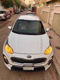 سبورتج مديل 21 بيسك موصفات عاديه ماشيه 37 الف حقيقي وع فحص سياره كفاله...