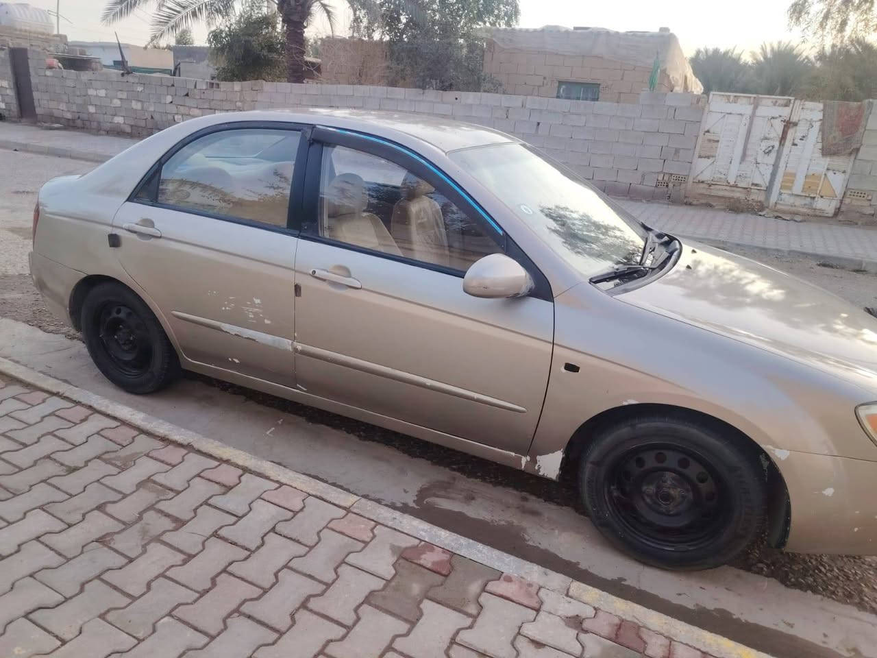 سلام عليكم سيراتو خليجي رقم بابل  نكليزي بأسمي مكينه وكير خير من الله ضرر جدا قليل جنطه ومعمره تبريد شغال ب59وبيهه مجال رقم ***********مكان واسط صويره
